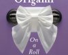 toilet paper origami on a roll